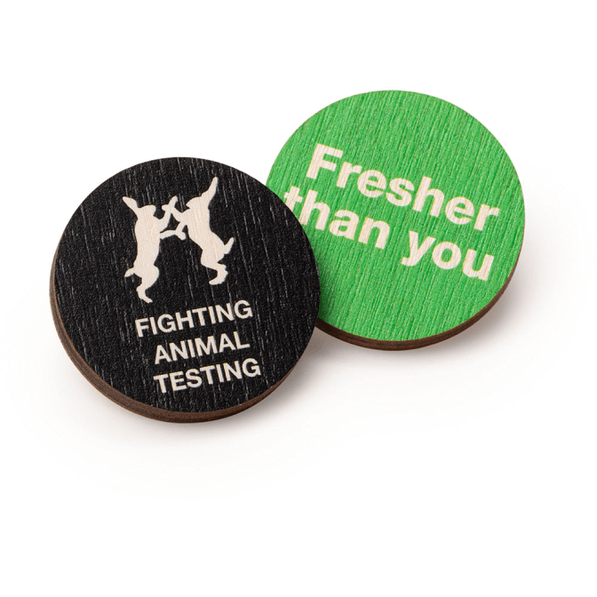 A picture of two badges, one says fighting animal testing, one says fresher than you